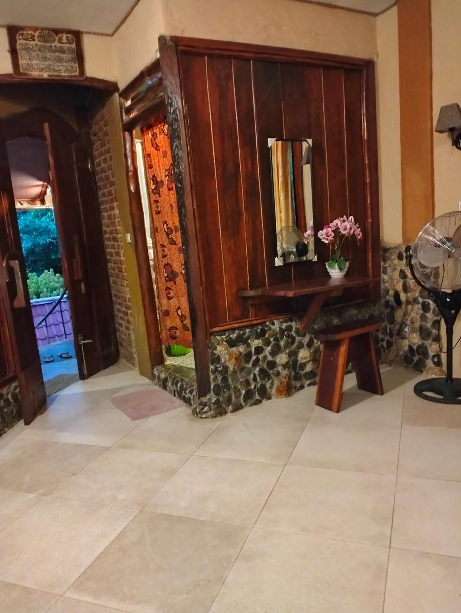 Junia Guesthouse بوكيت لاوانج الغرفة الصورة